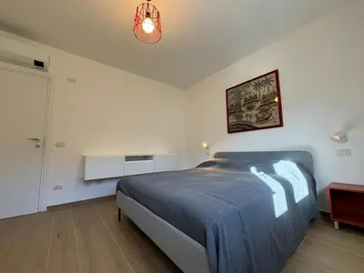 Letto o letti in una camera di La Terrazza di Mimì