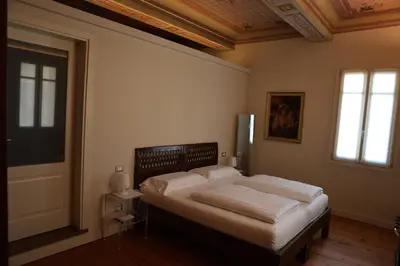 Letto o letti in una camera di DOMUS AQUENIGRE