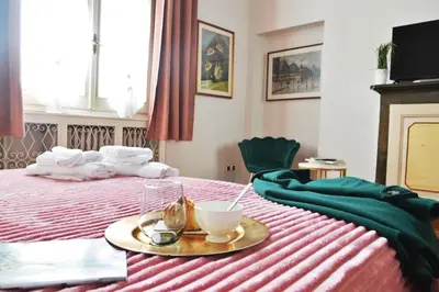 Letto o letti in una camera di Casa Del Teatro