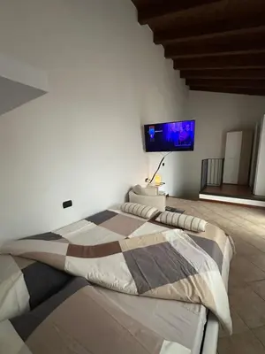Letto o letti in una camera di Appartamento 2 poggioli