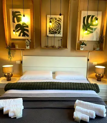 Letto o letti in una camera di APPARTAMENTO CREMONA FIERA