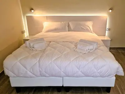 Letto o letti in una camera di La Corte del Maggiore