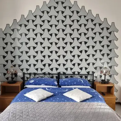 Letto o letti in una camera di Room e Breakfast Diana e Ninni Salsomaggiore Terme