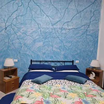 Letto o letti in una camera di Room e Breakfast Diana e Ninni Salsomaggiore Terme