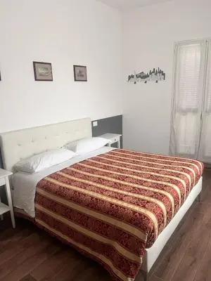Letto o letti in una camera di ALO ALO ALBERGO