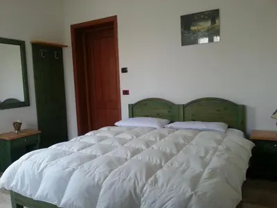 Letto o letti in una camera di RESIDENCE LA VECCHIA REGGIO