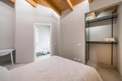 Letto o letti in una camera di Borgo degli Ulivi