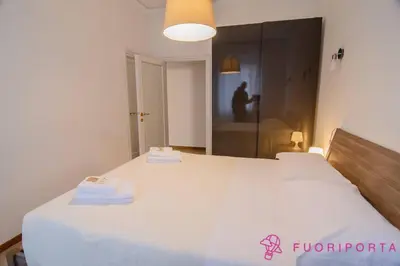Letto o letti in una camera di FuoriPorta Affitti Brevi - Borgo Maria Luigia