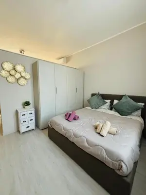 Letto o letti in una camera di Maison del Ducato Suite Parmigianino
