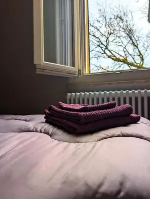 Letto o letti in una camera di Maison del Ducato Suite Parmigianino
