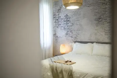 Letto o letti in una camera di Nella CORTE DEL MULINO, 1 passo dal centro con parcheggio