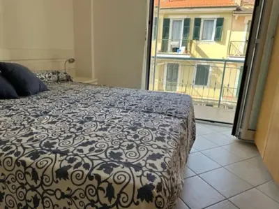 Letto o letti in una camera di Casa Marina - MONEGLIA APARTMENTS