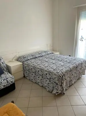 Letto o letti in una camera di Casa Marina - MONEGLIA APARTMENTS