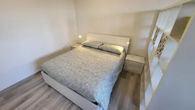 Letto o letti in una camera di Alloggio sul parco