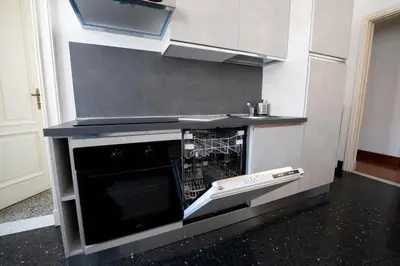 Cucina o angolo cottura di 236 - Casa Corso Colombo - Centro Storico, Mare e spiaggia a 200m - PARCHEGGIO GRATIS INCLUSO