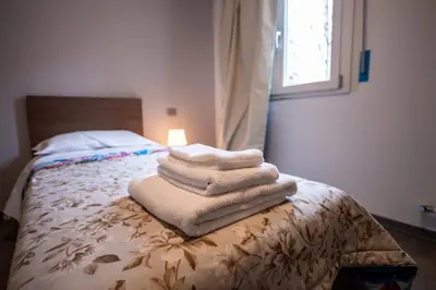 Letto o letti in una camera di Porta Galileo l Comfort Rooms & Parking