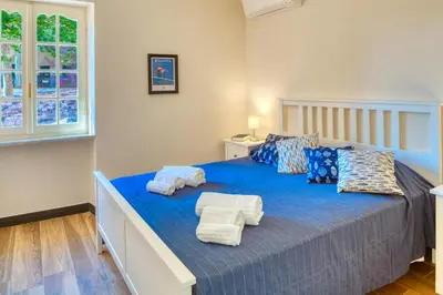 Letto o letti in una camera di PORTOVECCHIO Plus