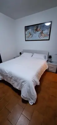 Letto o letti in una camera di APPARTAMENTO SERENA