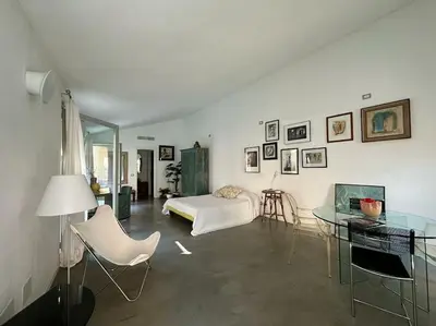 Area soggiorno di Suite per gli ospiti