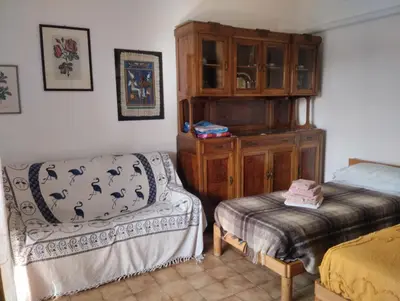 Letto o letti in una camera di Appartamento con posto auto privato comodo a centro e spiagge