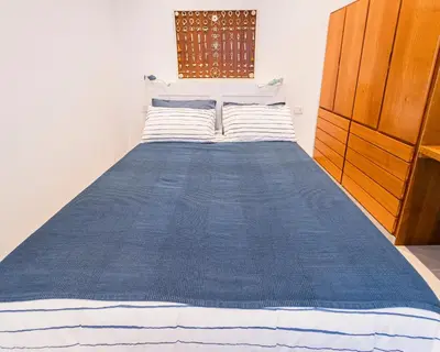 Letto o letti in una camera di La Casetta del Bistromare