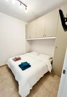 Letto o letti in una camera di Pavia in Charme - Intero Appartamento