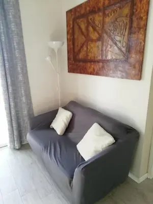 Area soggiorno di Delizioso trilocale Lodi città