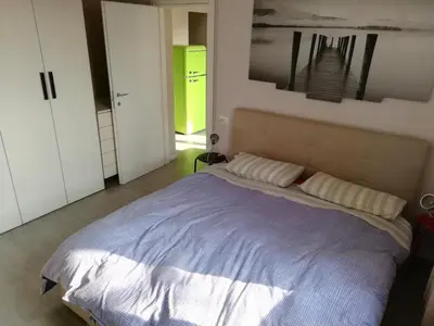 Letto o letti in una camera di Delizioso trilocale Lodi città