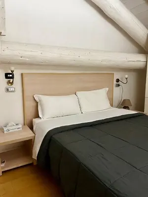 Letto o letti in una camera di Residenza Frattini