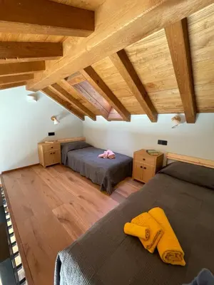 Letto o letti in una camera di Villa Nina
