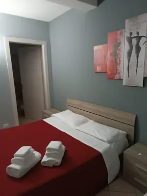 Letto o letti in una camera di HOTEL DED 1 CHECKIN a RICHIESTA