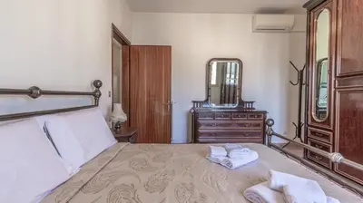 Letto o letti in una camera di Casa Pucci - Affitti Brevi Italia