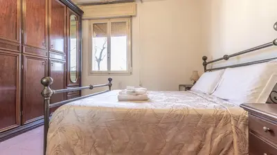 Letto o letti in una camera di Casa Pucci - Affitti Brevi Italia