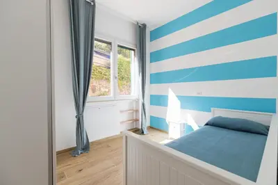 Letto o letti in una camera di La casa dei Paoli, Levanto