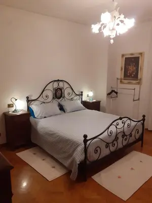 Letto o letti in una camera di Gold House