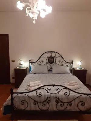Letto o letti in una camera di Gold House