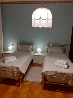 Letto o letti in una camera di Gold House