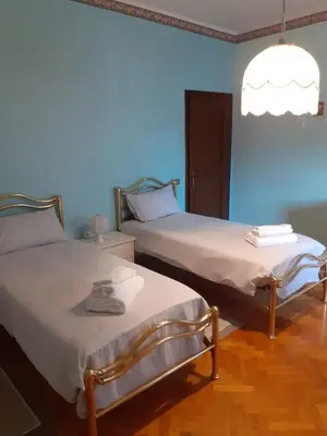 Letto o letti in una camera di Gold House