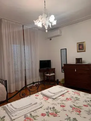 Letto o letti in una camera di Gold House