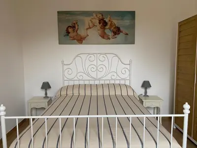 Letto o letti in una camera di Casina Levanto, levanto