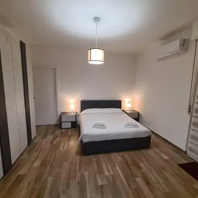 Letto o letti in una camera di Apartment Garibaldi