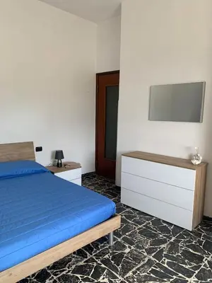Letto o letti in una camera di Casa Martina