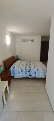 Letto o letti in una camera di Cà Laudemia