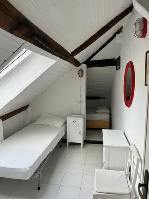 Letto o letti in una camera di CASA MARIA ROSA - a pochi passi dal mare
