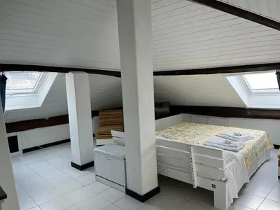 Letto o letti in una camera di CASA MARIA ROSA - a pochi passi dal mare