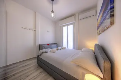 Letto o letti in una camera di CASA PIOPPI Comfort e una bella vista