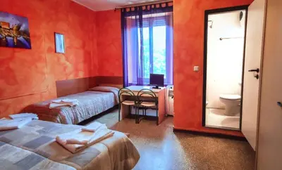 Letto o letti in una camera di Hotel Violetta