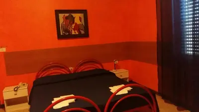 Letto o letti in una camera di Hotel Violetta