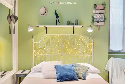 Letto o letti in una camera di Basilico e Papaja, Terre Marine