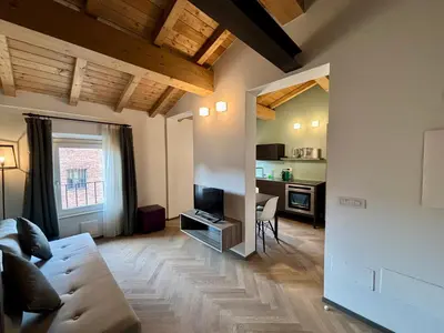 Area soggiorno di Appartamenti Saragozza a due passi da Piazza Grande - WIFI e parcheggio gratuito
